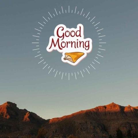 Mountain landscape during sunrise with a clear blue sky