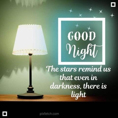 a simple indoor good night wishes with a lamp on a wooden table